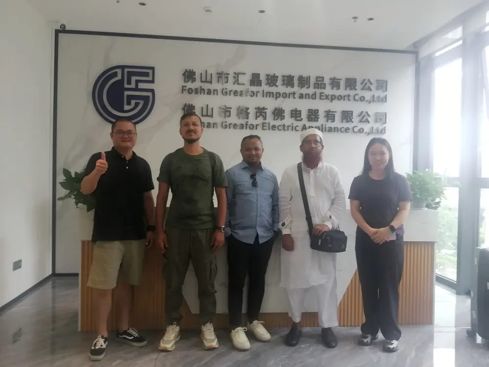 South Asian customer visiting Greafor factory in Foshan China to review blender blades motors gear components and glass jars